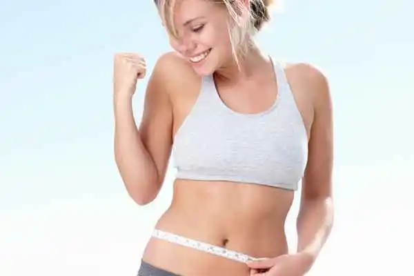 woman happy after fat reduction treatment Earl's Court
