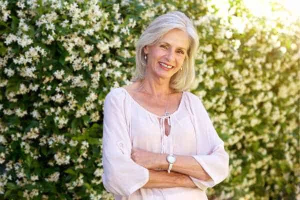 Older woman happy with urinary incontinence treatment Earl's Court