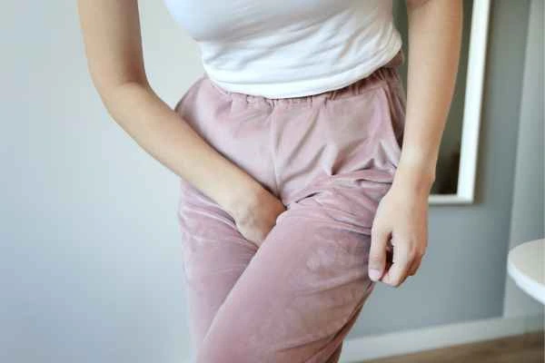 older woman running to the toilet because of urinary incontinence Earl's Court