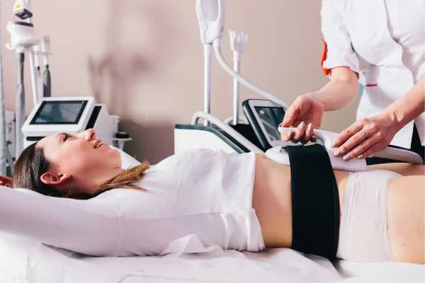 woman having body sculpting to help improve her body image and her mental health Earl's Court
